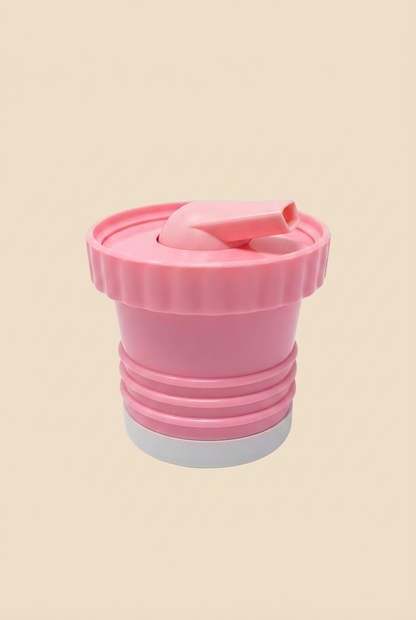 Tapón rosa sobre fondo beige sin sombras
